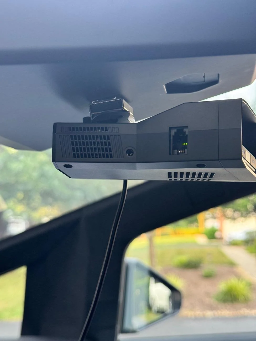 Tesla Cybertruck Uniden Radar Detector magnetic mount IMG_0808