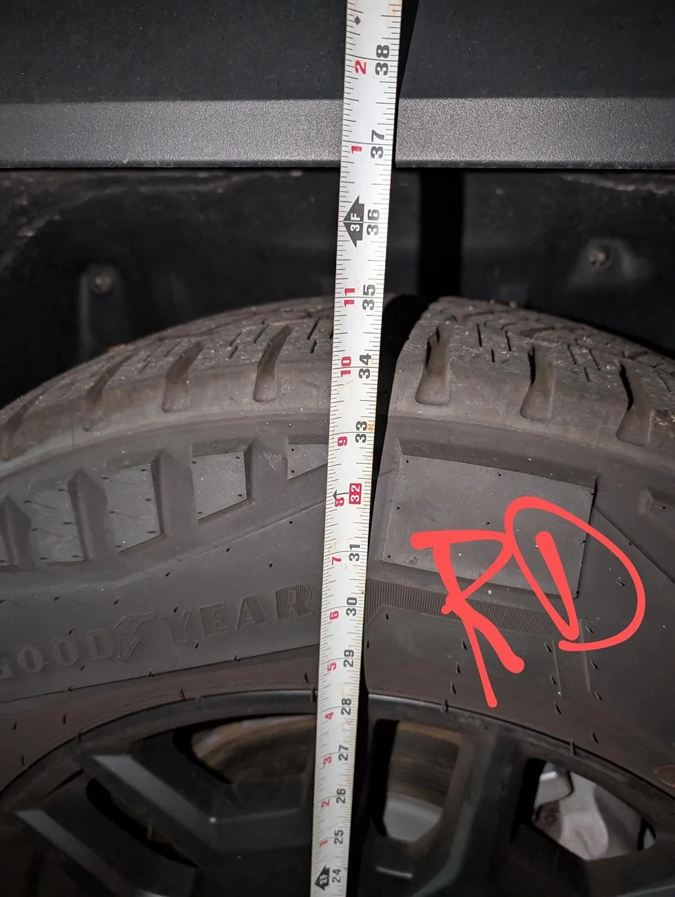 Tesla Cybertruck Tilted / lopsided rear end suspension (passenger side is 3/4" taller & higher than the driver side) 1000008802