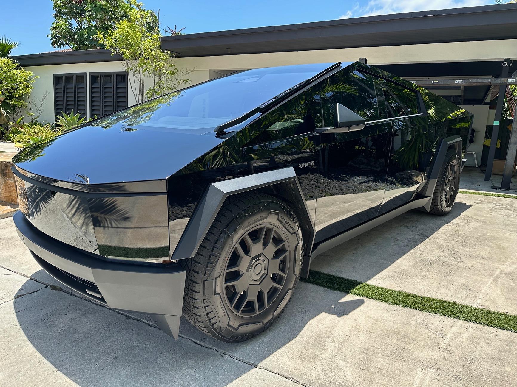 Tesla Cybertruck DIY PPF in Deep Gloss Black + 30% tint on DRL LED + Cyberbeast graffiti on tailgate under PPF cyberfrontwholejuly