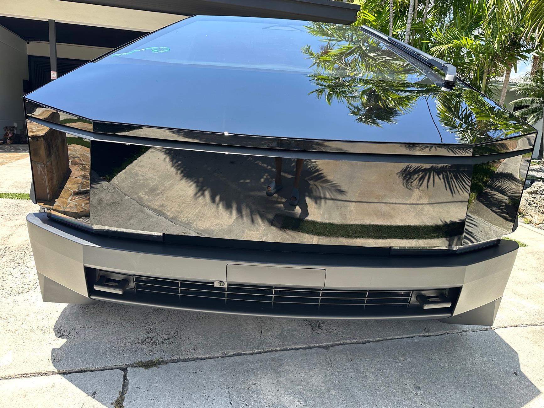 Tesla Cybertruck DIY PPF in Deep Gloss Black + 30% tint on DRL LED + Cyberbeast graffiti on tailgate under PPF cyberfrontfrontjuly