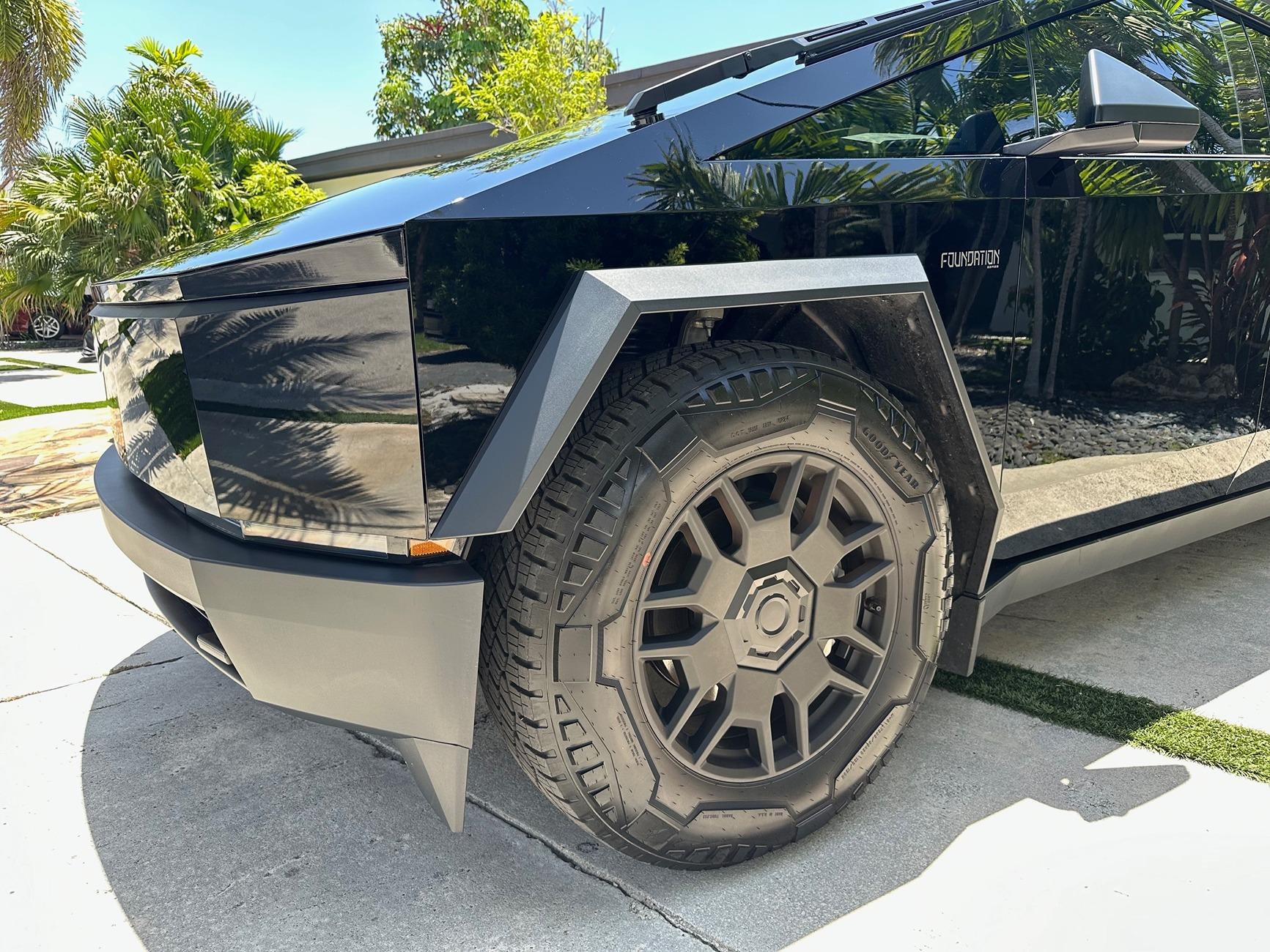 Tesla Cybertruck DIY PPF in Deep Gloss Black + 30% tint on DRL LED + Cyberbeast graffiti on tailgate under PPF cyberfrontjuly