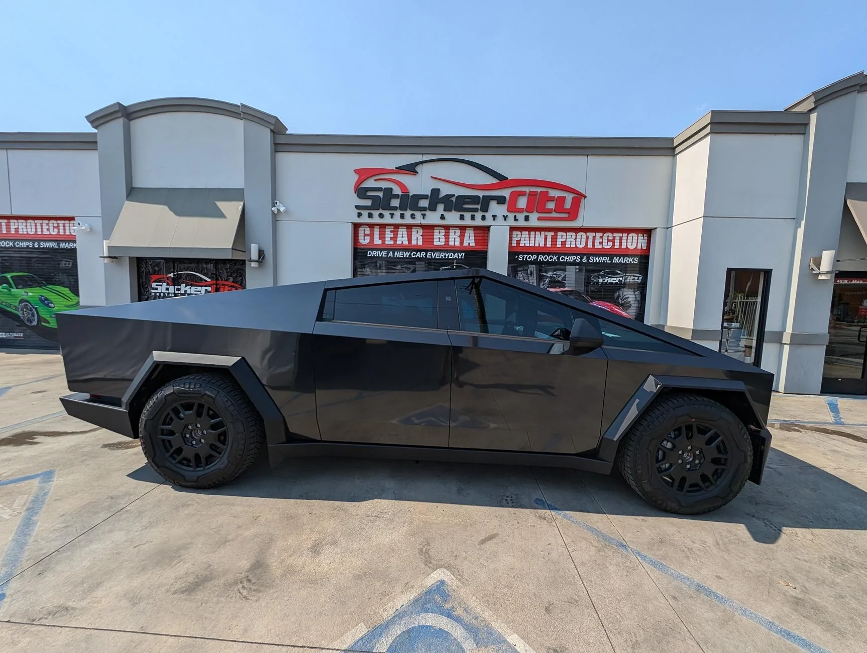 Tesla Cybertruck Stickercity Offers $300 Discount for Cybertruck Colored PPF Wrap in Los Angeles LA Cybertruck wraps paint protection film ppf vinyl color change satin black liquid silver stick