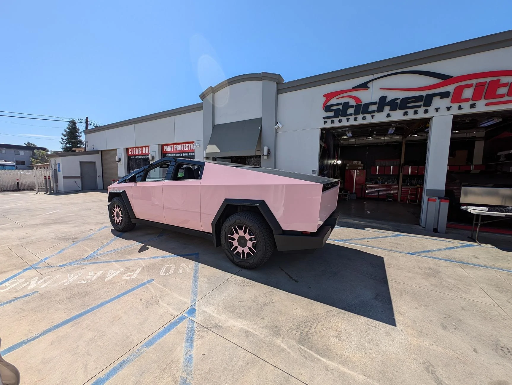 Tesla Cybertruck Pink on a Cybertruck??? Pink Cybertruck Tesla stickercity los angeles paint protection wrap vinyl color change access