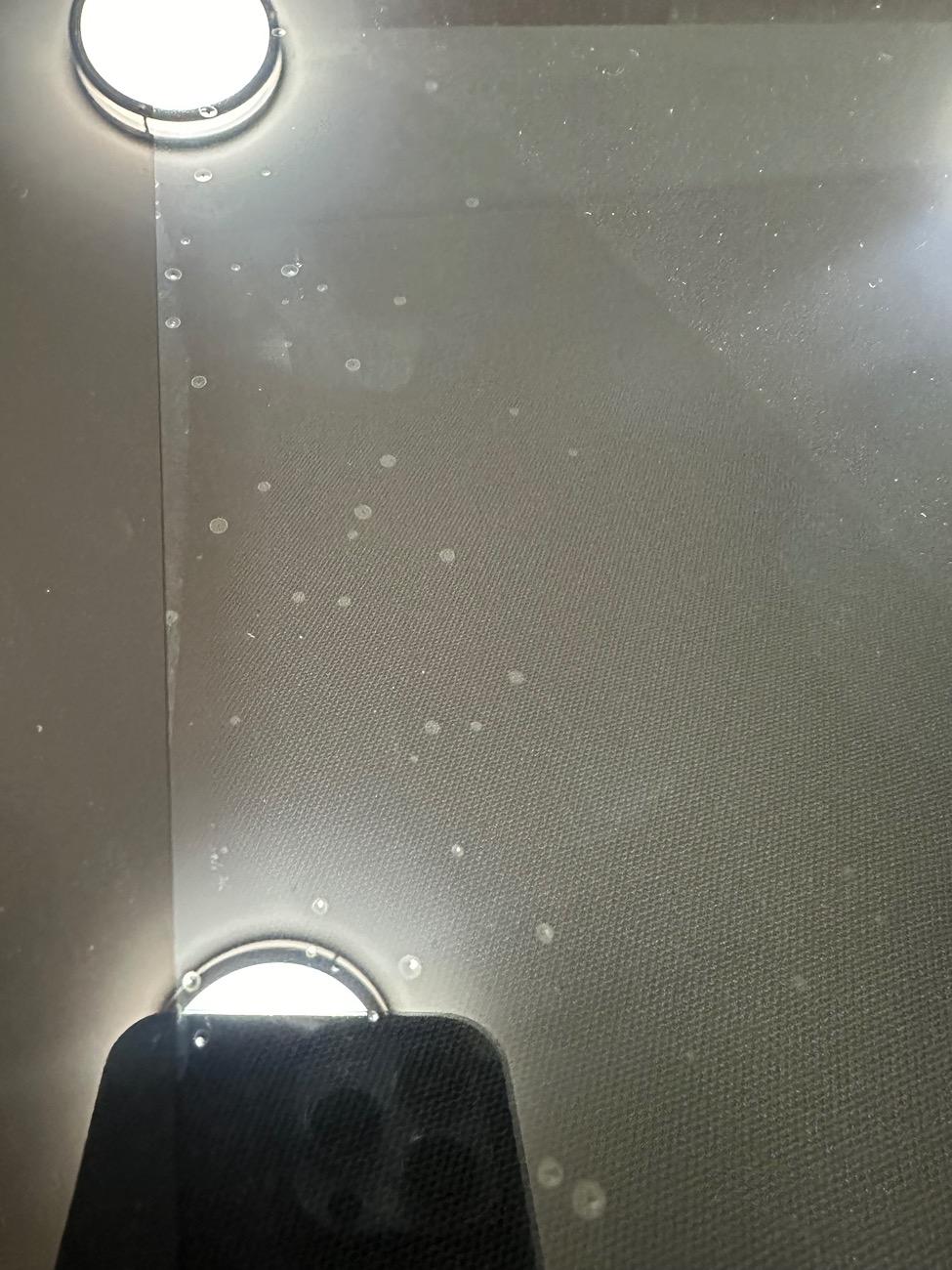 Tesla Cybertruck Front Window Tint bubbles IMG_3485