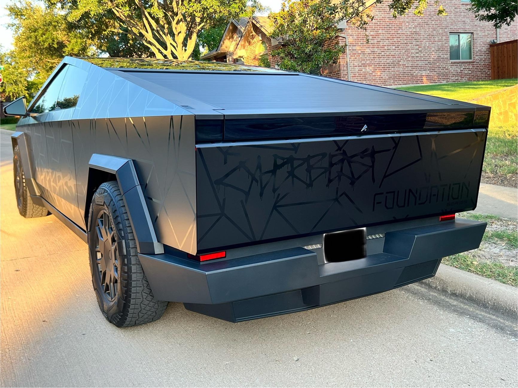 Tesla Cybertruck Black Satin Wrap + Gloss Poly Lines and Gloss CyberBeast Lettering IMG_1718