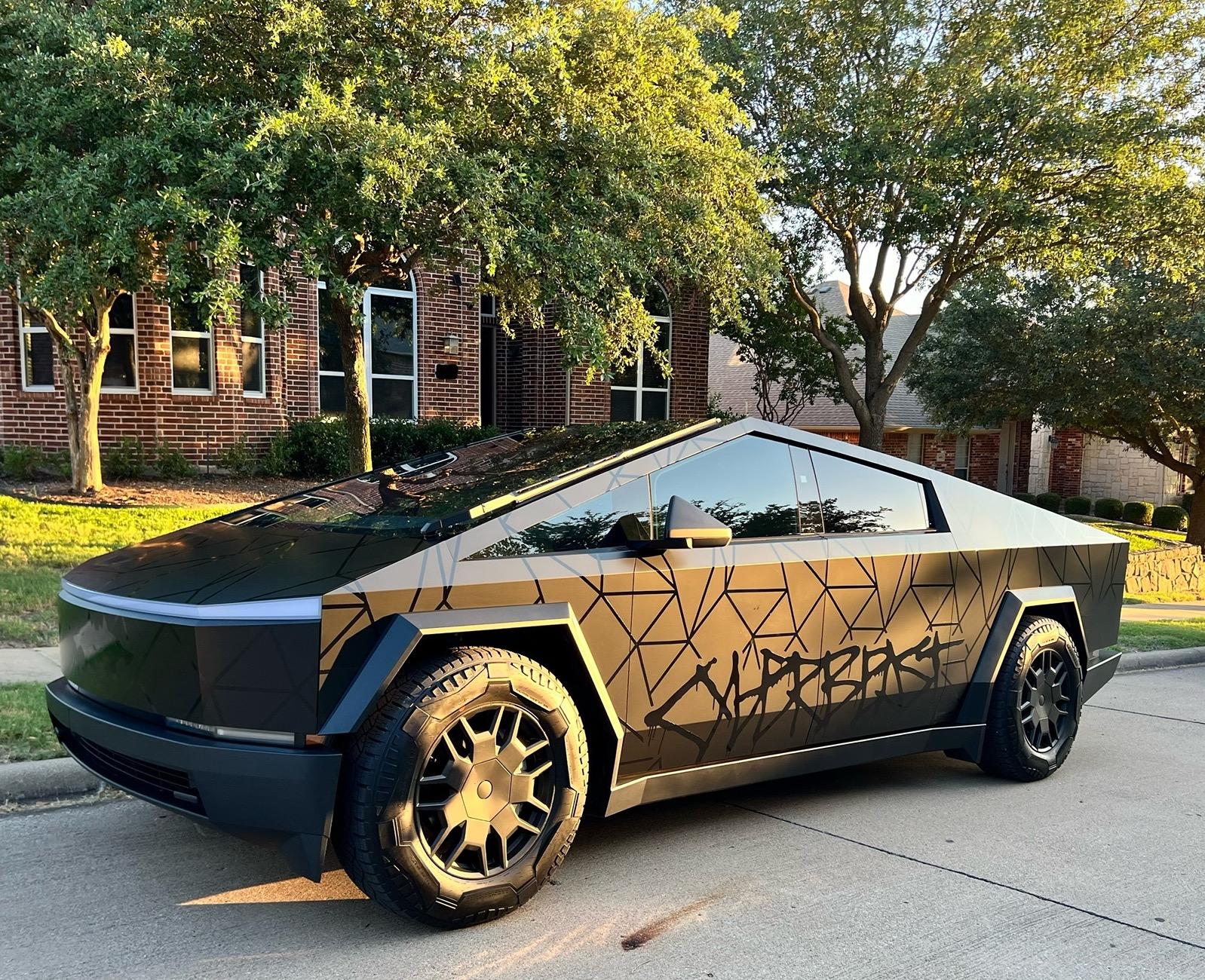 Tesla Cybertruck Black Satin Wrap + Gloss Poly Lines and Gloss CyberBeast Lettering FullSizeRender