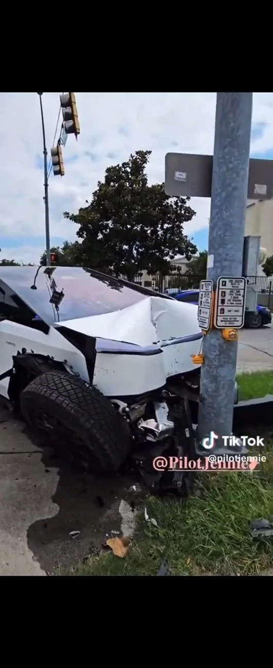 Tesla Cybertruck White Cybertruck crashes head first into traffic light post. Totaled. 1000009382