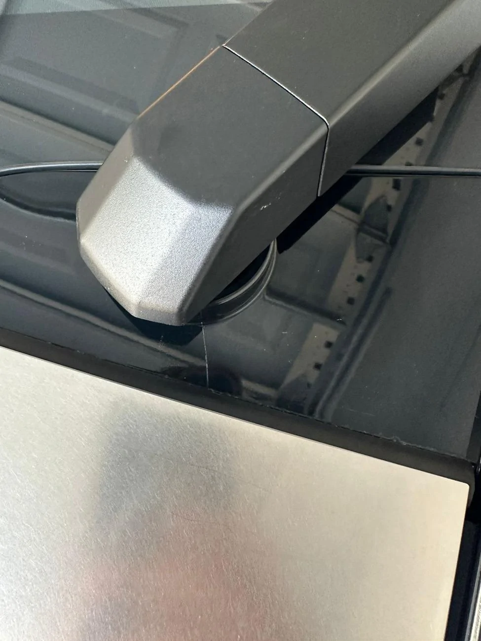 Tesla Cybertruck Glass / Plastic trim below wiper crack 59e9e141-5508-4064-b001-0e52d9462c48