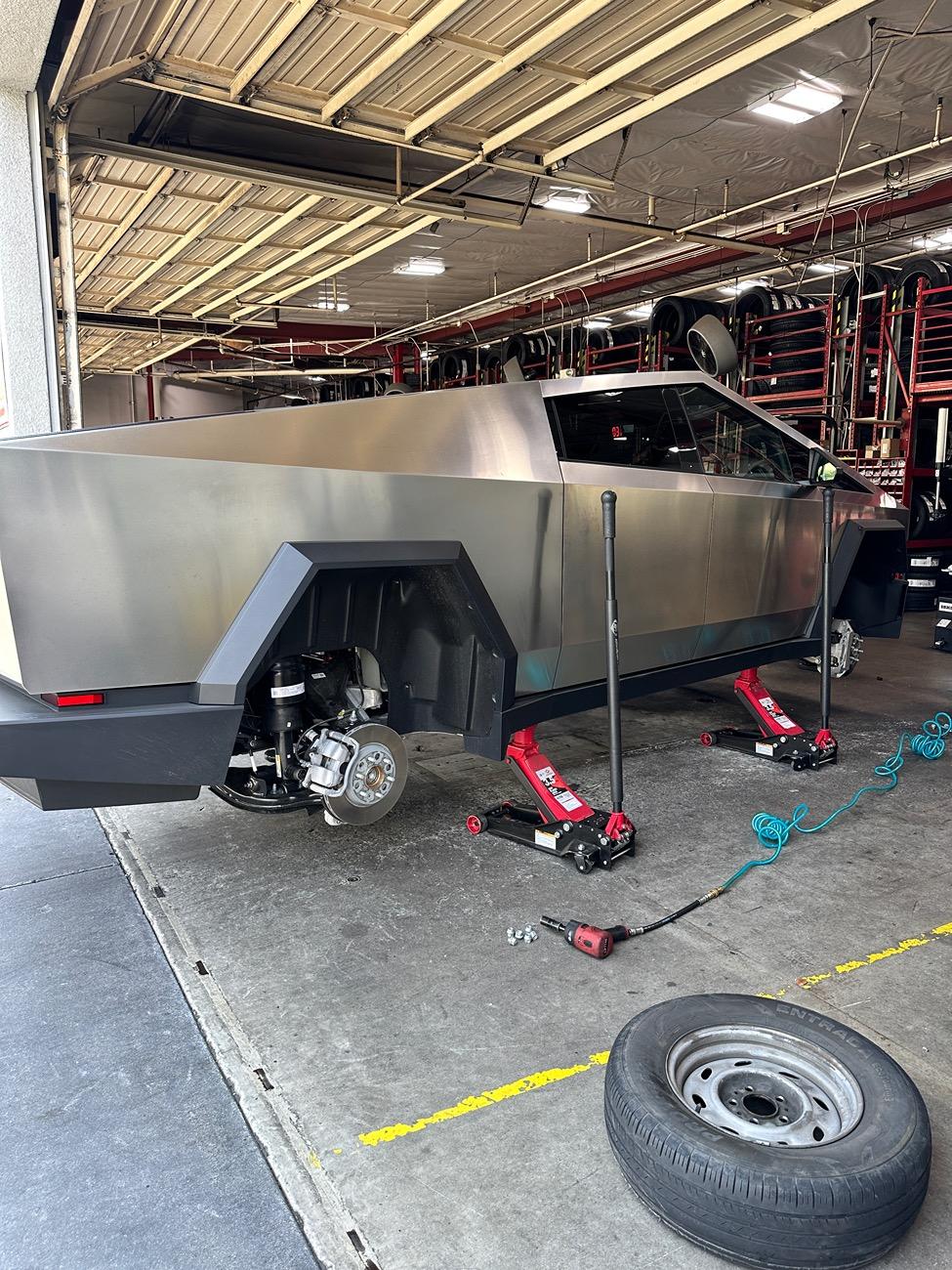 Tesla Cybertruck Rotating Tires at home using floor jack and jack-stands ? IMG_5387