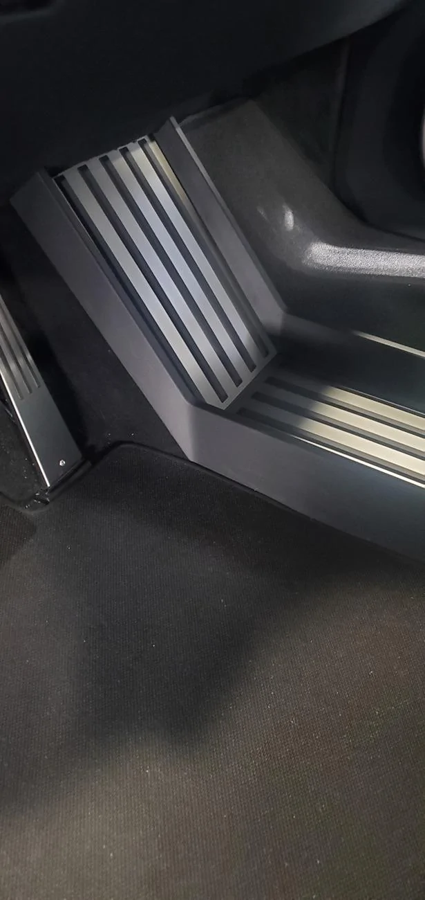 Tesla Cybertruck Tesla Under seat storage is awesome, but needs a liner. 20240809_182524