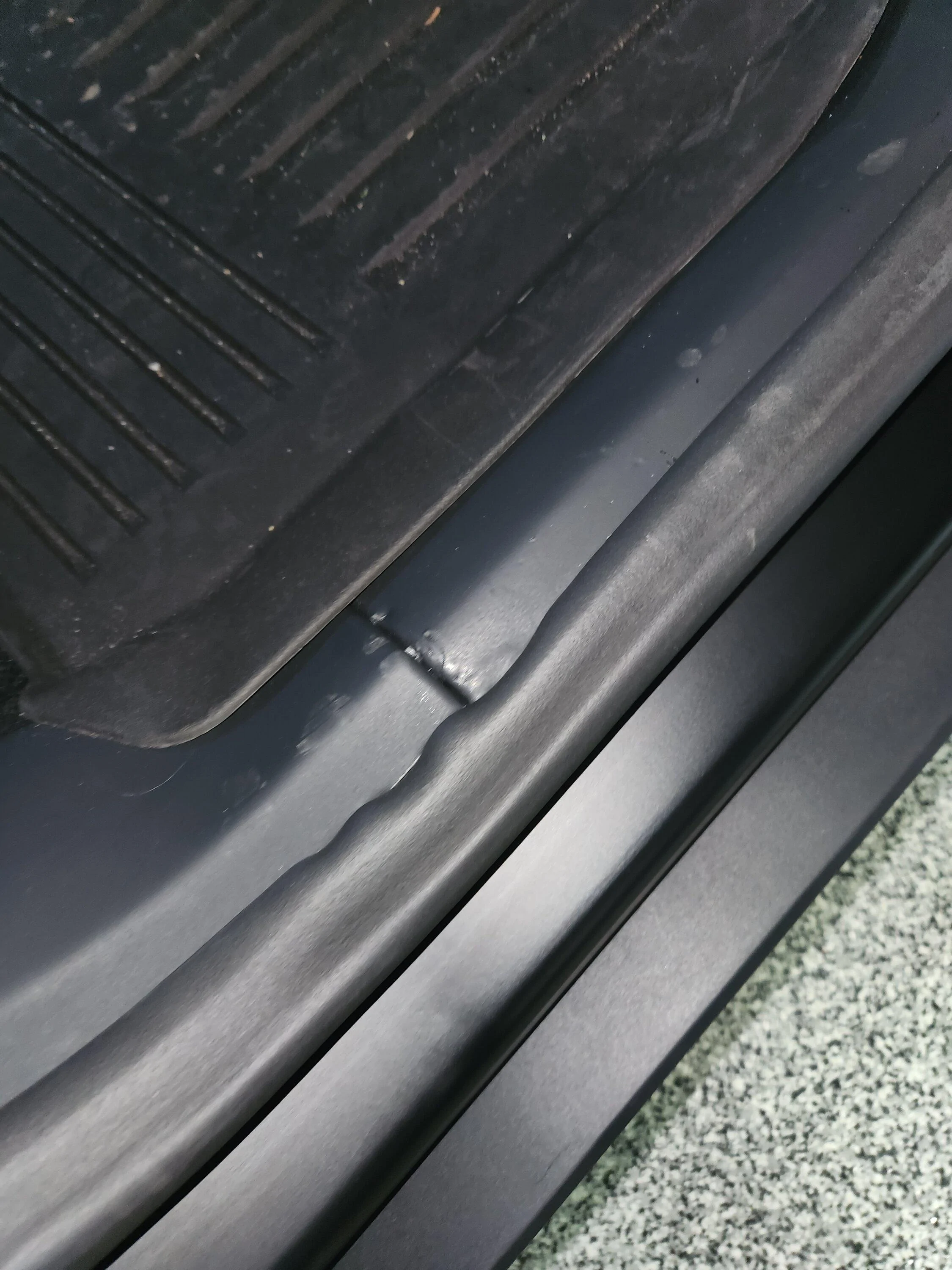Tesla Cybertruck Rear passenger interior side sill foam material -- permanent markings / tears 20240514_095610