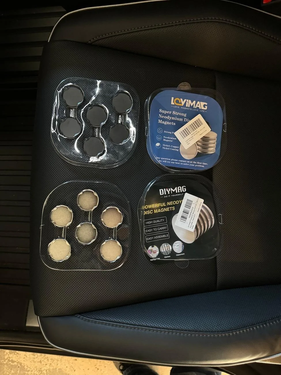 Tesla Cybertruck Magnetically door-mounted trash cups to free up cupholders and keep your cabin tidy! IMG_1583