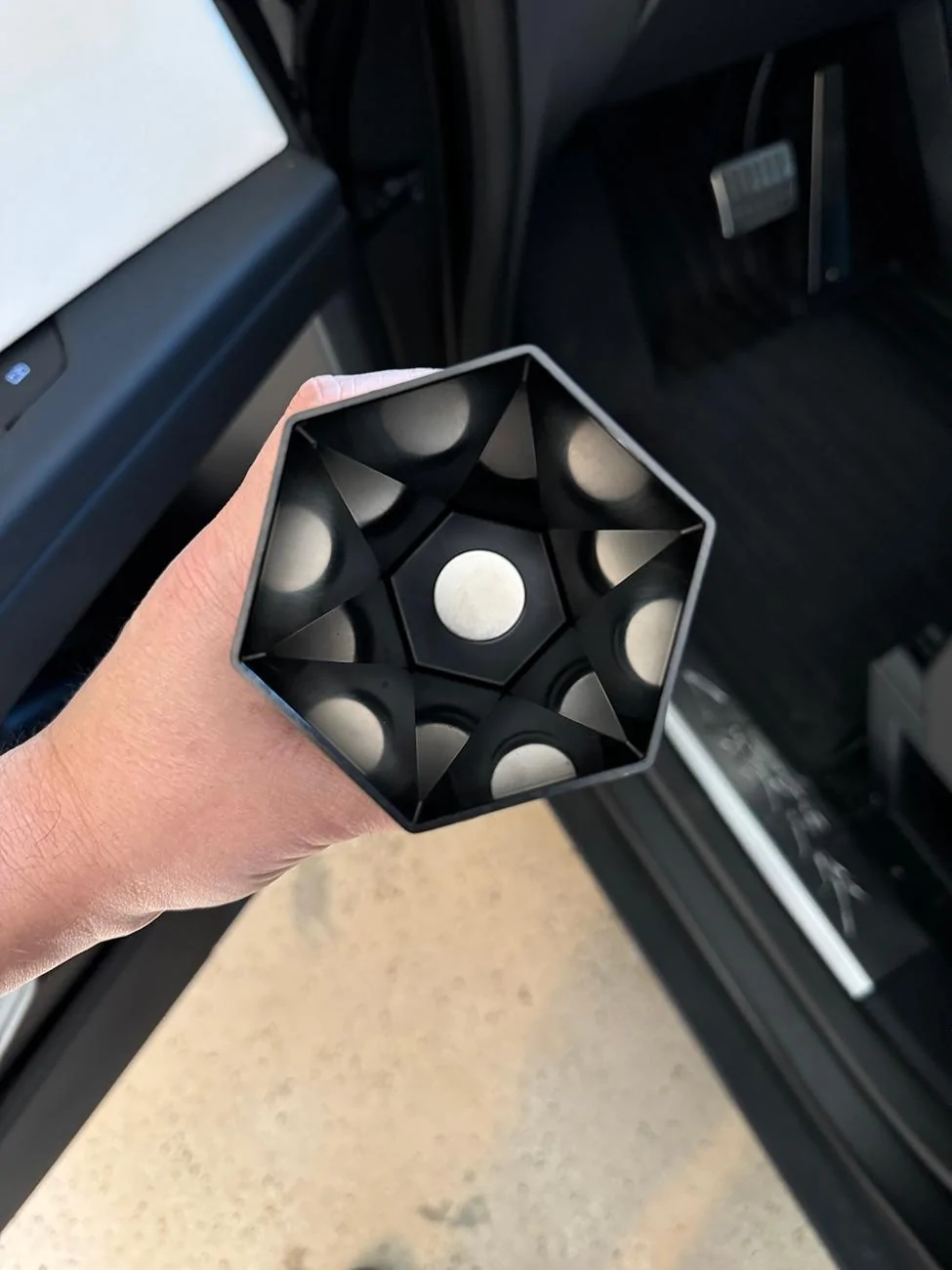 Tesla Cybertruck Magnetically door-mounted trash cups to free up cupholders and keep your cabin tidy! IMG_1589