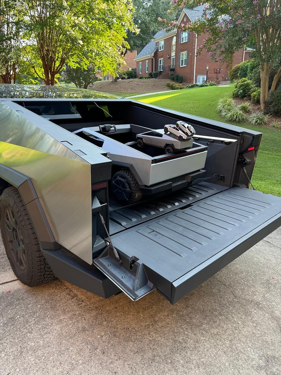 Tesla Cybertruck My Cybertruck giving birth > to even more generations now 🚼 IMG_1607