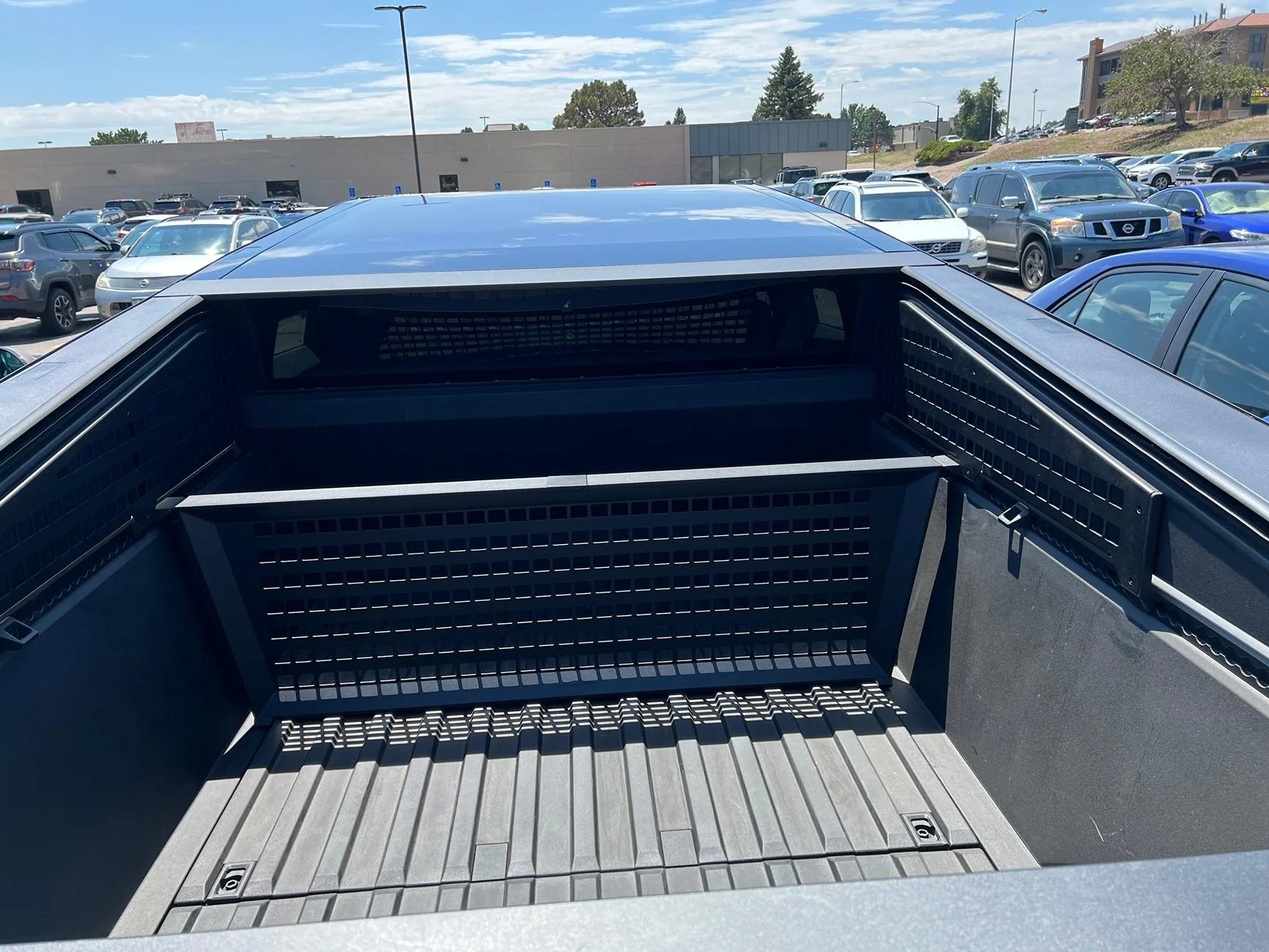 Tesla Cybertruck Sold -Molle Panels both sides and Cargo Divider. IMG_9556