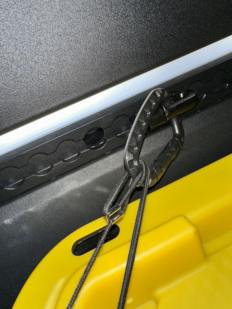 Tesla Cybertruck Careful when installing bed MOLLE Panels -- don't lose retaining nut in hole on L-track IMG_1571