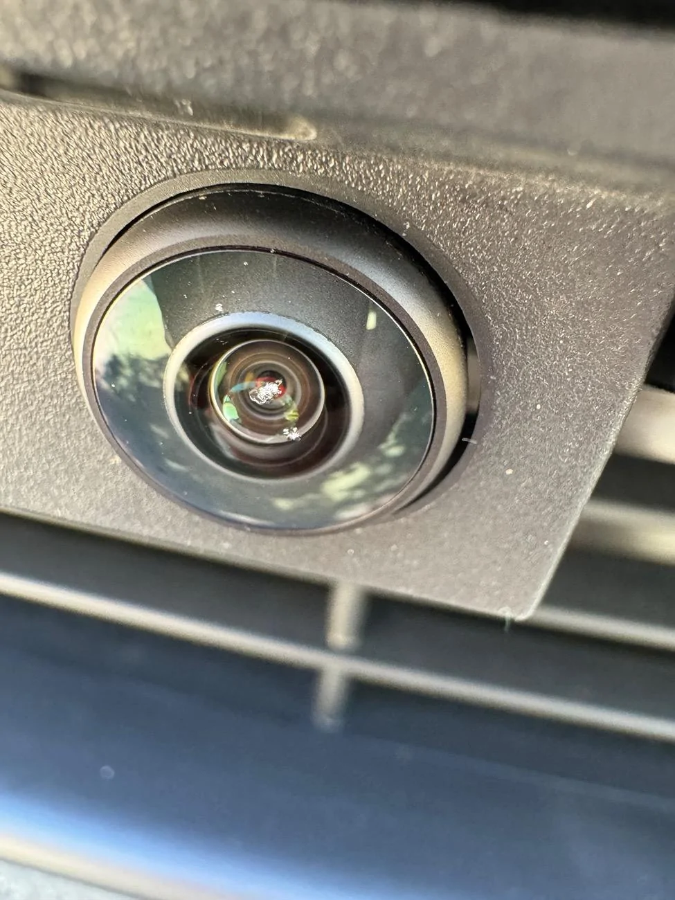 Tesla Cybertruck Chips in front camera lens IMG_0976
