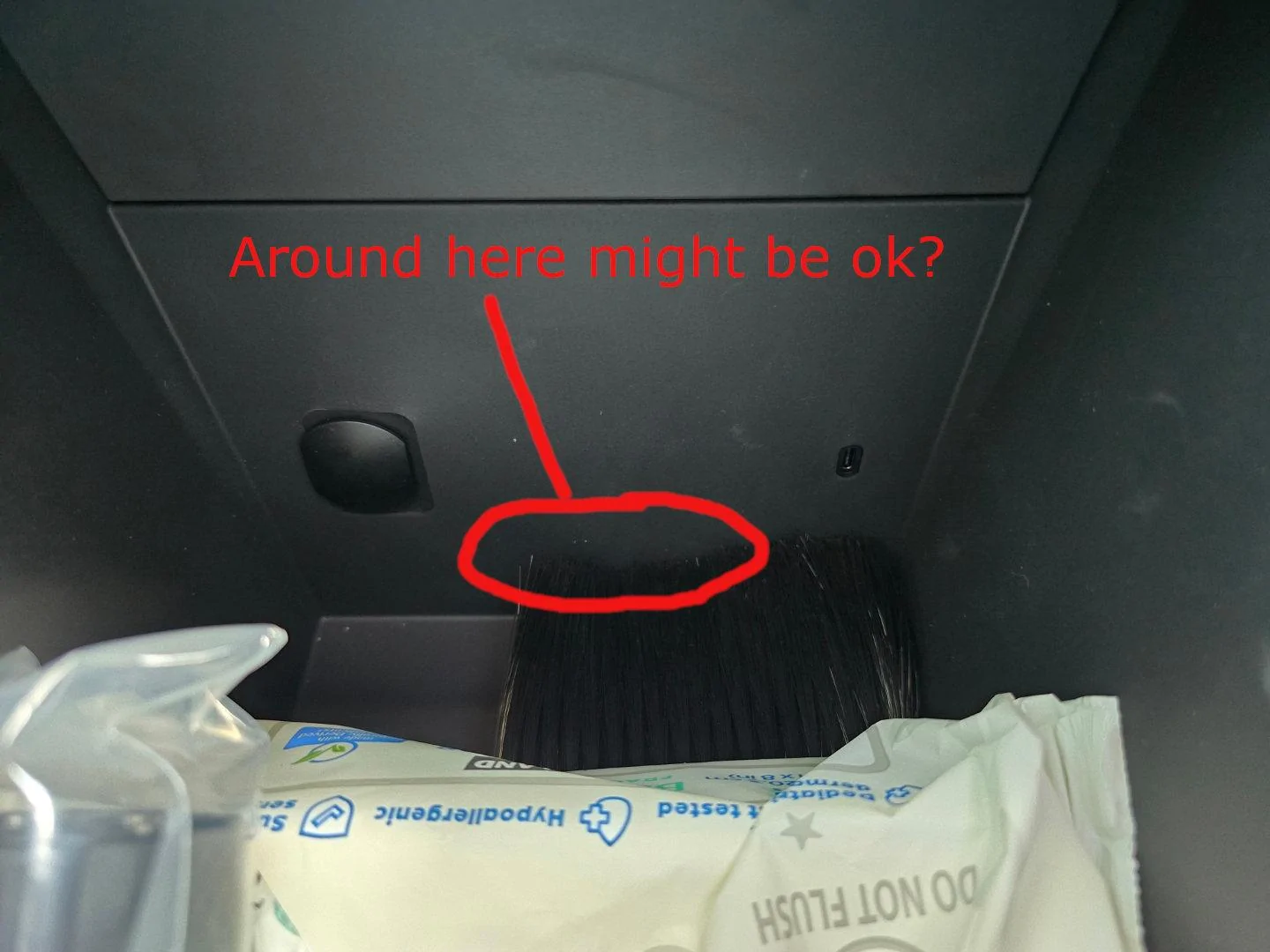 Tesla Cybertruck Anyone drilled into front of center console for a power wire / cable to come out? 20240621_141347