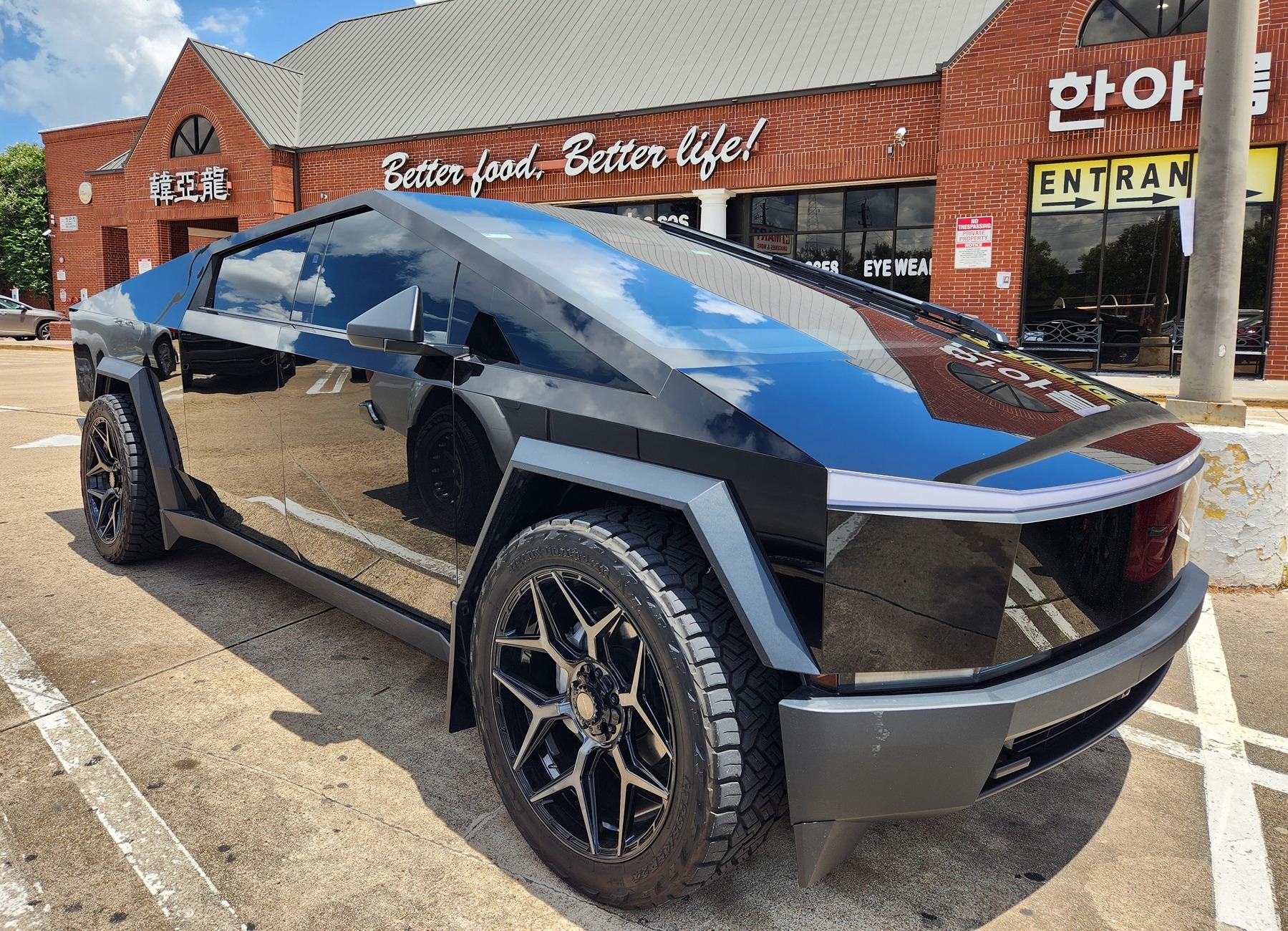 Tesla Cybertruck Gloss Black Cybertruck on 24" Wheels (4PLAY) and Nitto Ridge Grappler A/T Tires 295/45R24 Gloss Black Cybertruck on 24%22 Wheels (4PLAY) and Nitto Ridge Grappler A:T Tires 295:45R24 4