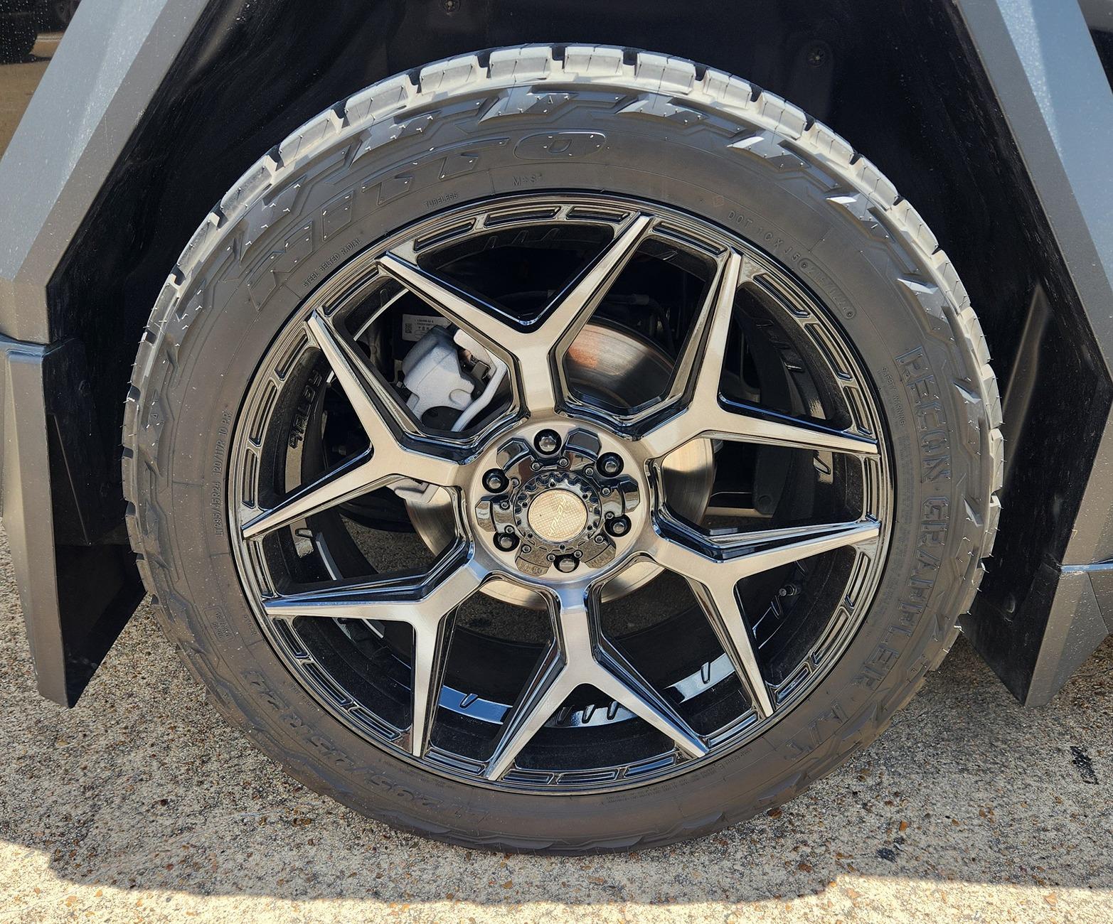 Tesla Cybertruck Gloss Black Cybertruck on 24" Wheels (4PLAY) and Nitto Ridge Grappler A/T Tires 295/45R24 Gloss Black Cybertruck on 24%22 Wheels (4PLAY) and Nitto Ridge Grappler A:T Tires 295:45R24 1
