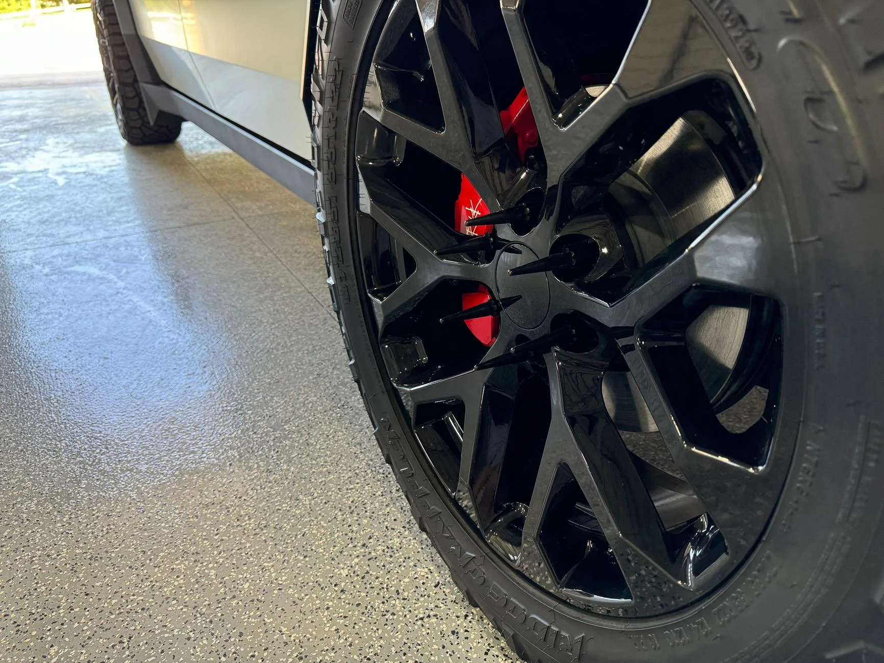 Tesla Cybertruck New Wrap (Satin White), Aftermarket Wheels, Nitto Ridge Grappler Tires, Painted Brakes Calipers w/ Cybertruck Logo IMG_0096