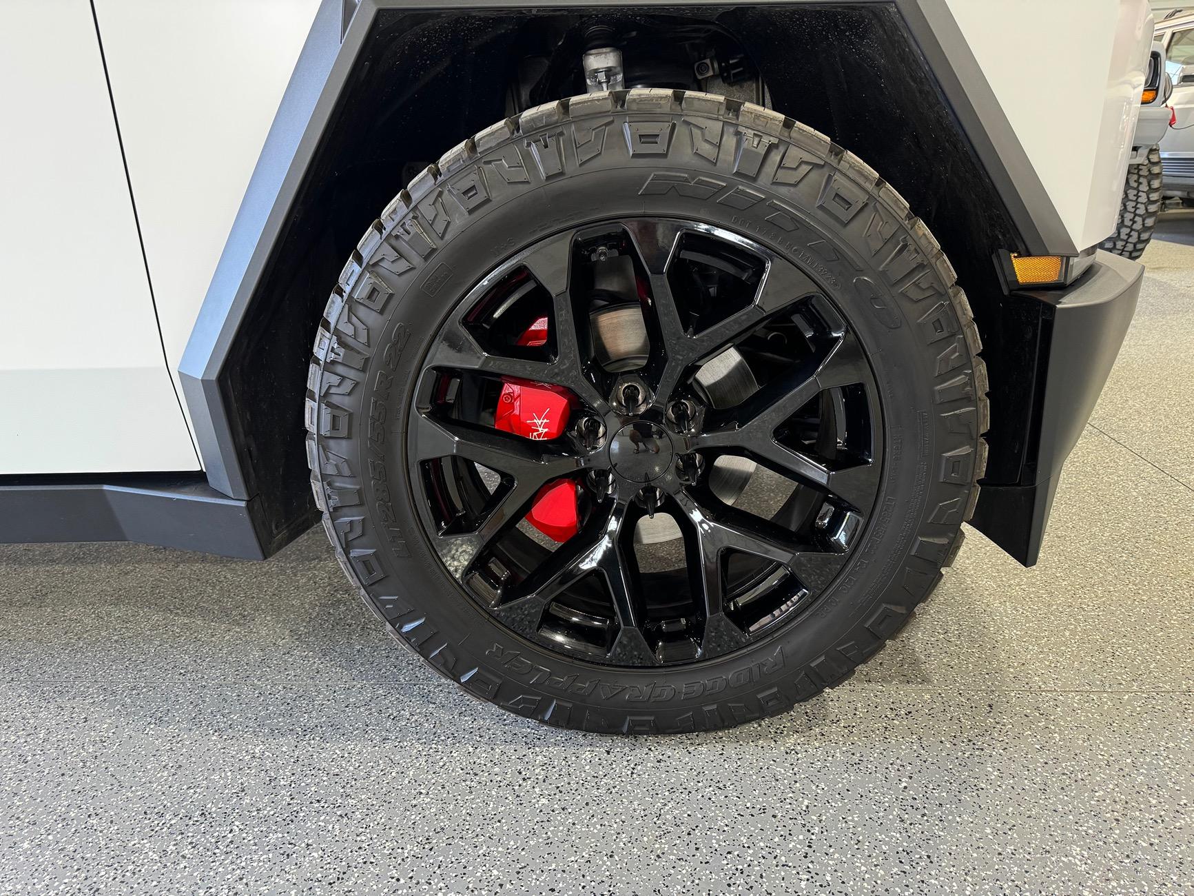 Tesla Cybertruck New Wrap (Satin White), Aftermarket Wheels, Nitto Ridge Grappler Tires, Painted Brakes Calipers w/ Cybertruck Logo IMG_0095
