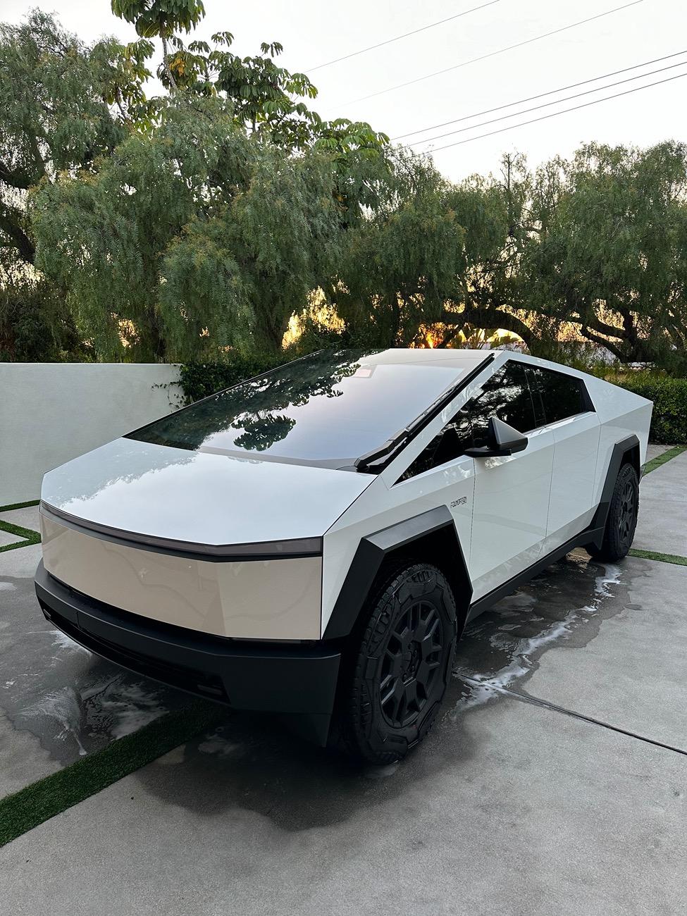 Tesla Cybertruck New Wrap (Satin White), Aftermarket Wheels, Nitto Ridge Grappler Tires, Painted Brakes Calipers w/ Cybertruck Logo IMG_6028