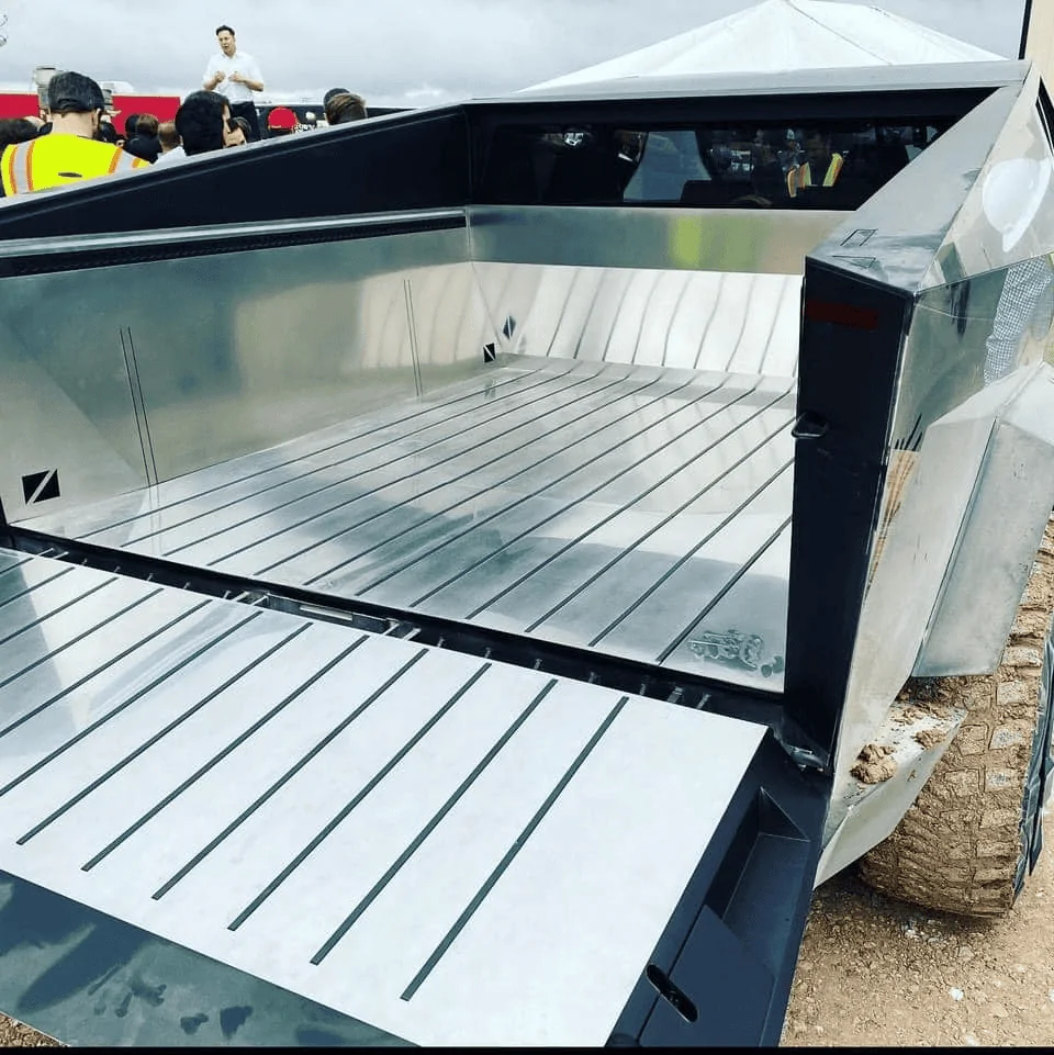 Tesla Cybertruck ? Cybertruck Spotted at Giga Texas Plant! + Interior Look with Yoke Steering Wheel and Performance Pedals! 1618856732626