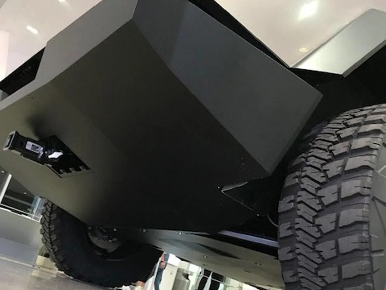 Tesla Cybertruck Cybertruck camper with spare tire carrier on tailgate 8059B7D0-270F-4501-A748-AFE51E265DE4-1 x1240