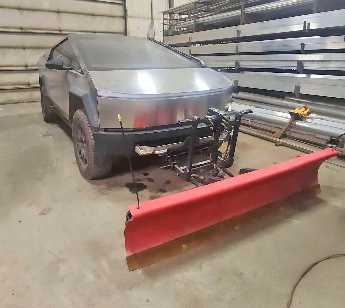 Tesla Cybertruck First Snowplow installed on a Cybertruck snowplow cybertruck