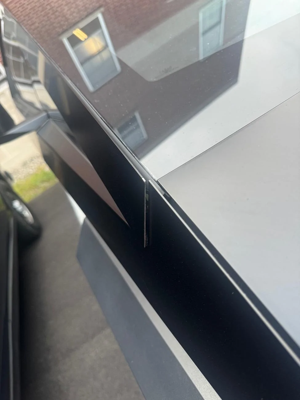Tesla Cybertruck Stainless steel is popping off IMG_3937