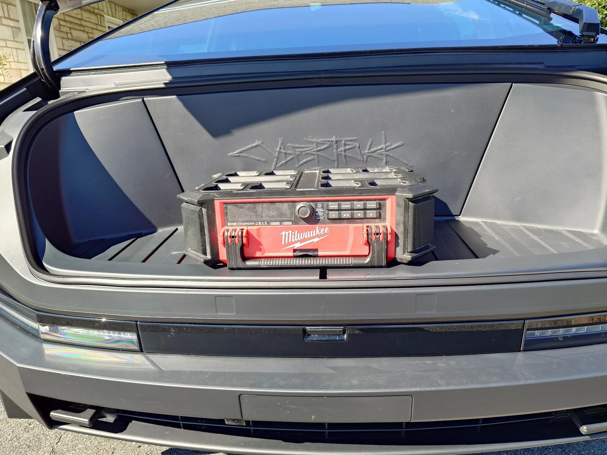 Tesla Cybertruck Party speaker in frunk -- which ones fit and can be secured with factory cargo net? cybertruck-packout1