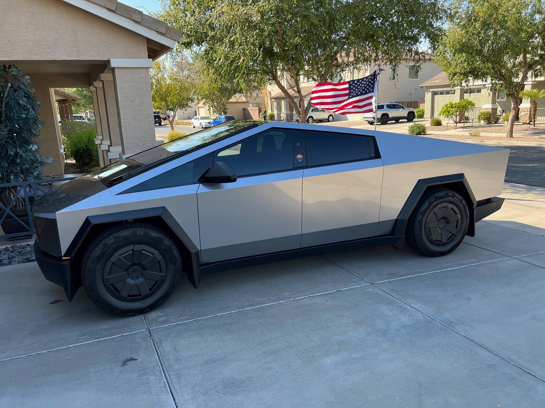 Tesla Cybertruck Stealth Wrap - PPF, FlexiShield Shining Silver HG-09, Lots of compliments :-) CT Side 2