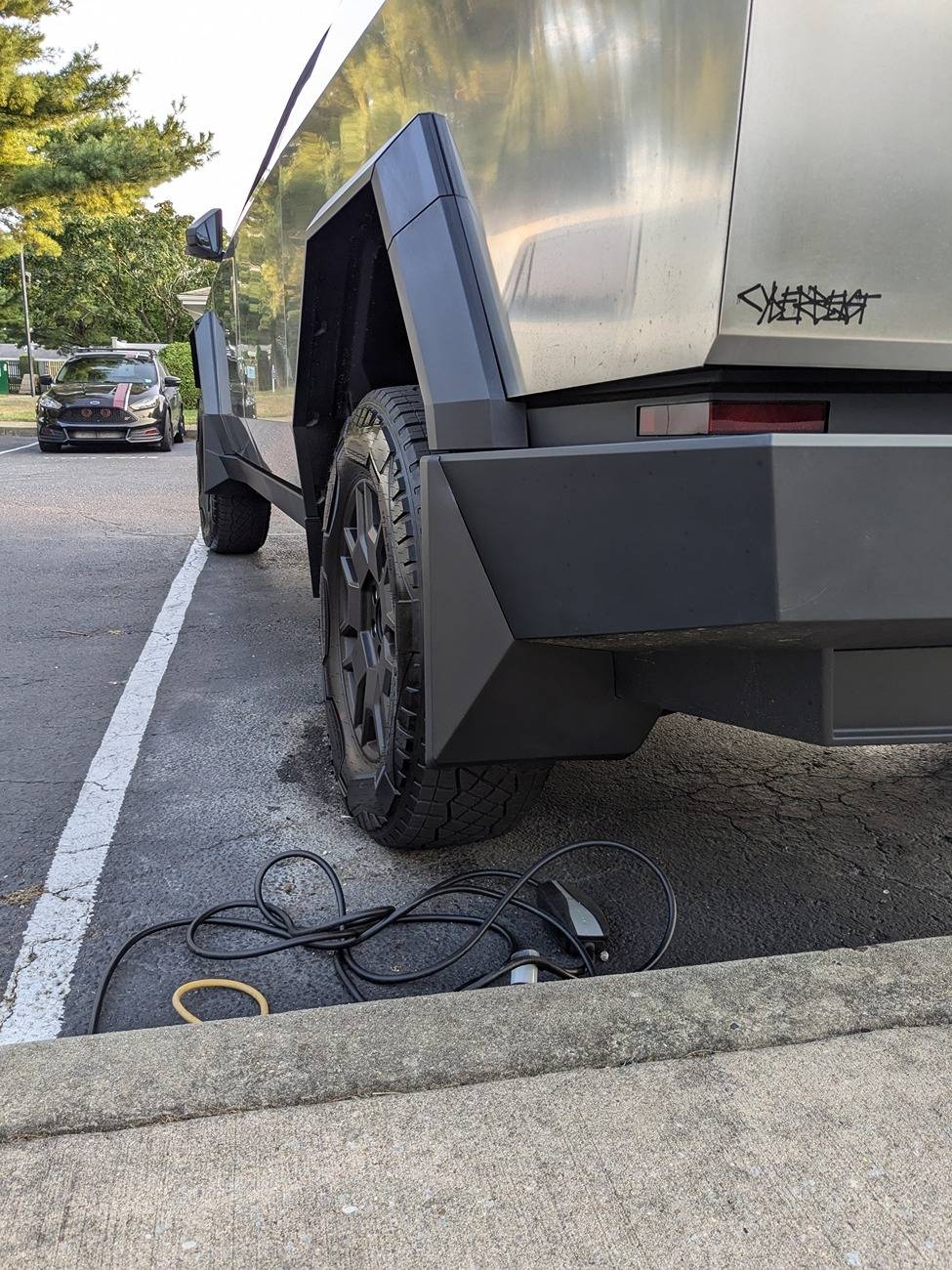 Tesla Cybertruck New decals and mud flaps installed today 1000011742