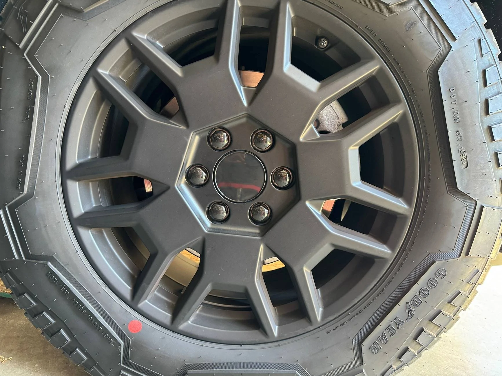 Tesla Cybertruck OEM Wheel Covers vs. Aftermarket Wheel Center Caps – Your Opinion Matters! 🛞 IMG_0689