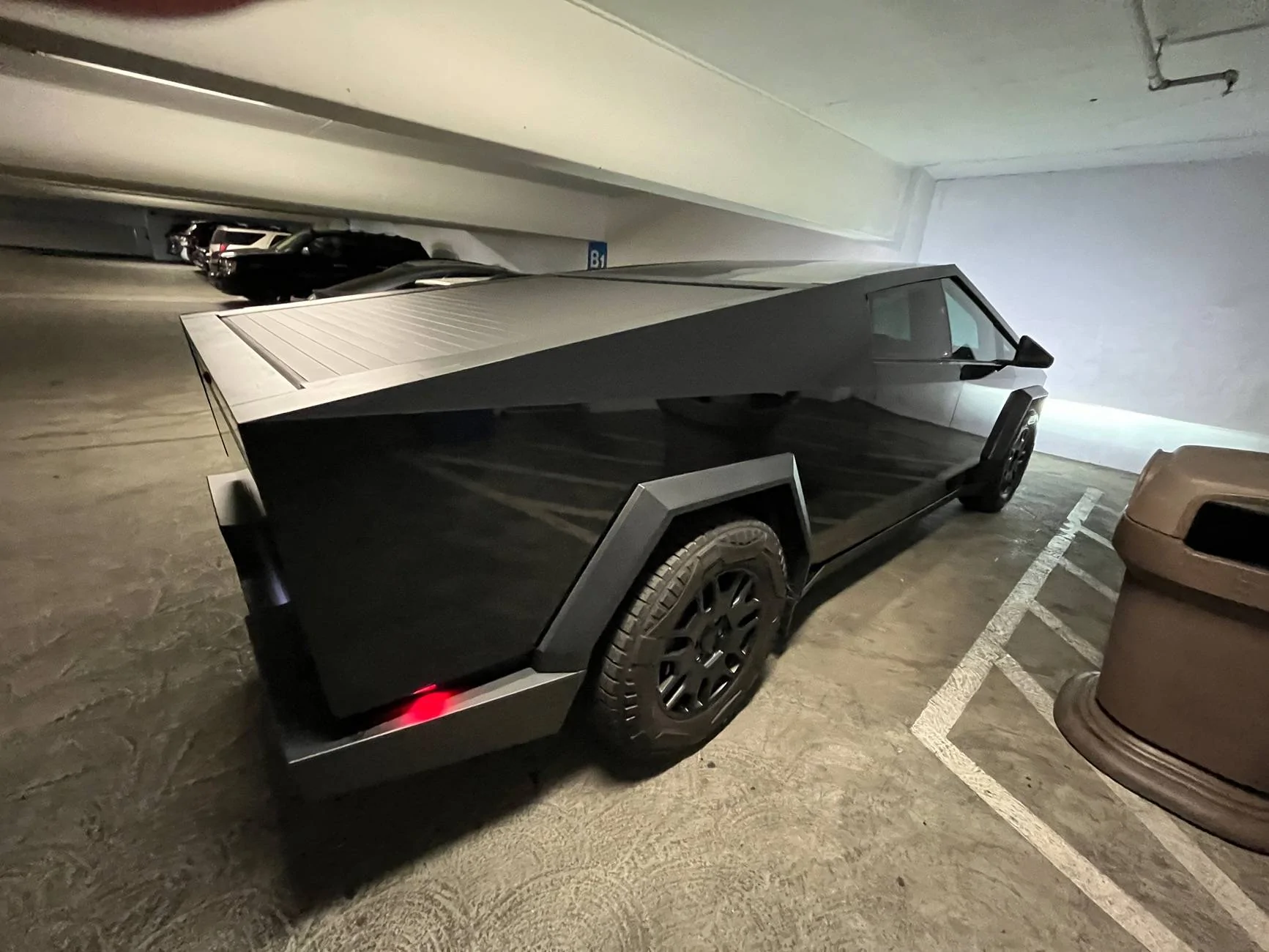 Tesla Cybertruck ? For anyone who wrapped gloss black … wavy panels? IMG_5089