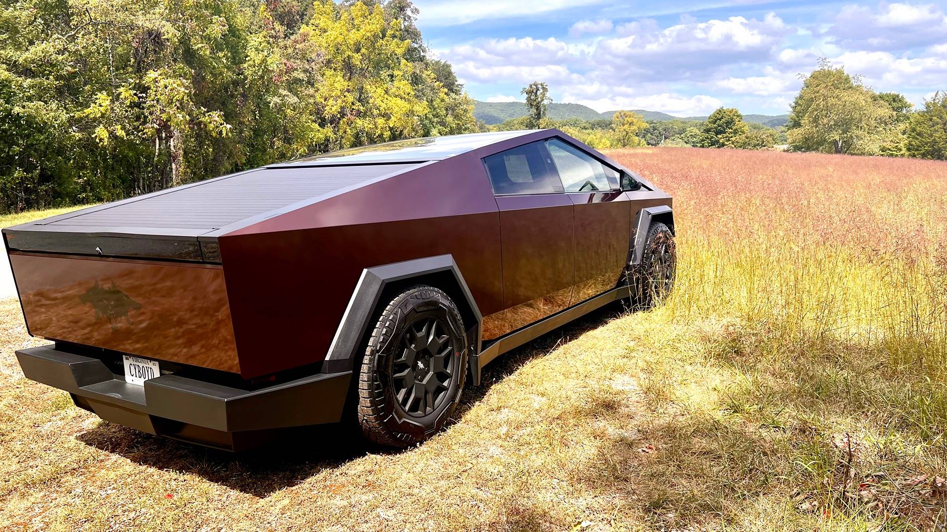 Tesla Cybertruck No more SS worries, wrapped in Avery Gloss Passion Red IMG_3637