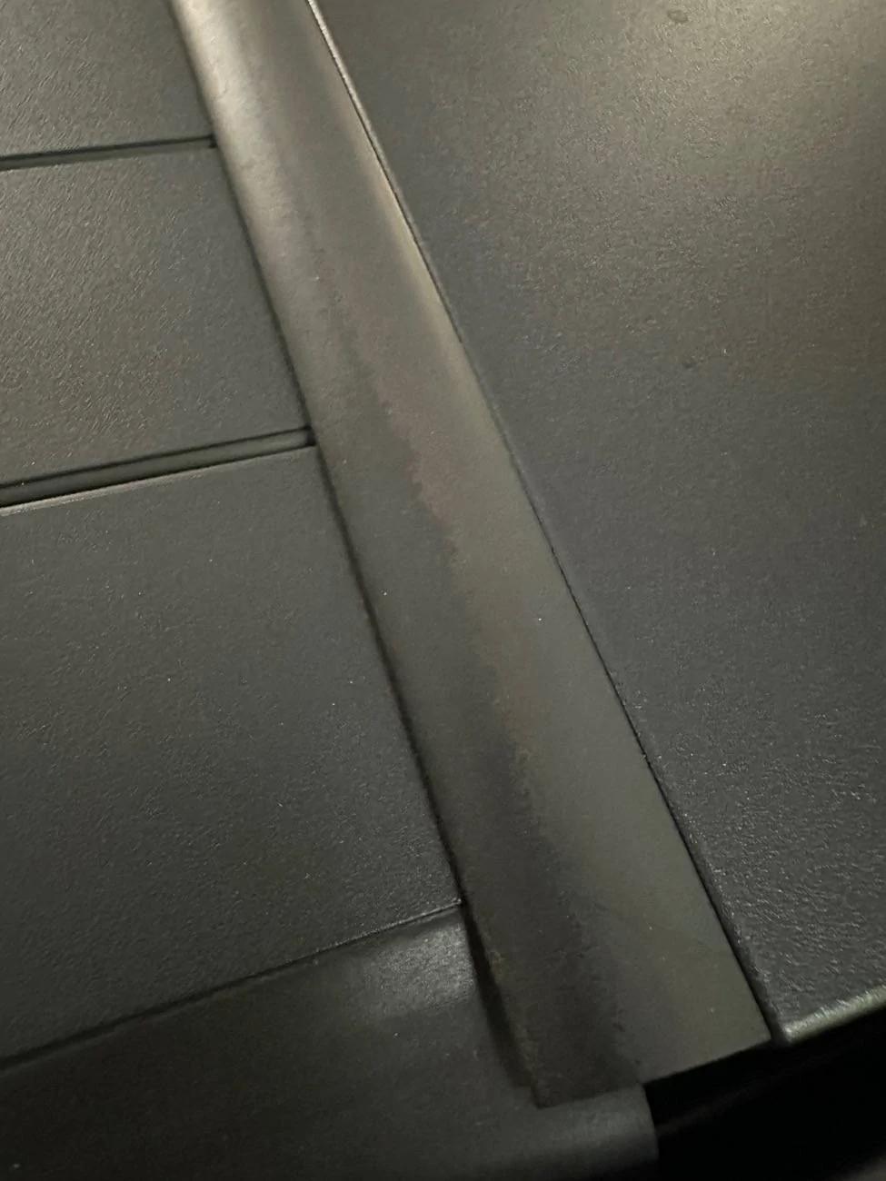 Tesla Cybertruck Weathering of rubber along tonneau cover IMG_7611