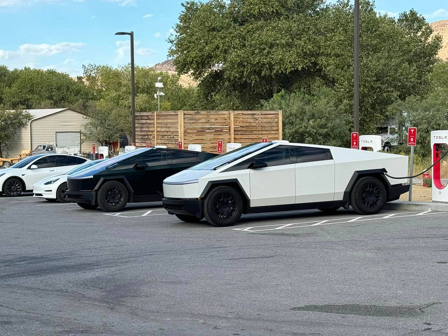 Tesla Cybertruck WHITE Vinyl Wrap & PPF Cybertruck -- Photos & Videos white vs black tesla cybertruck