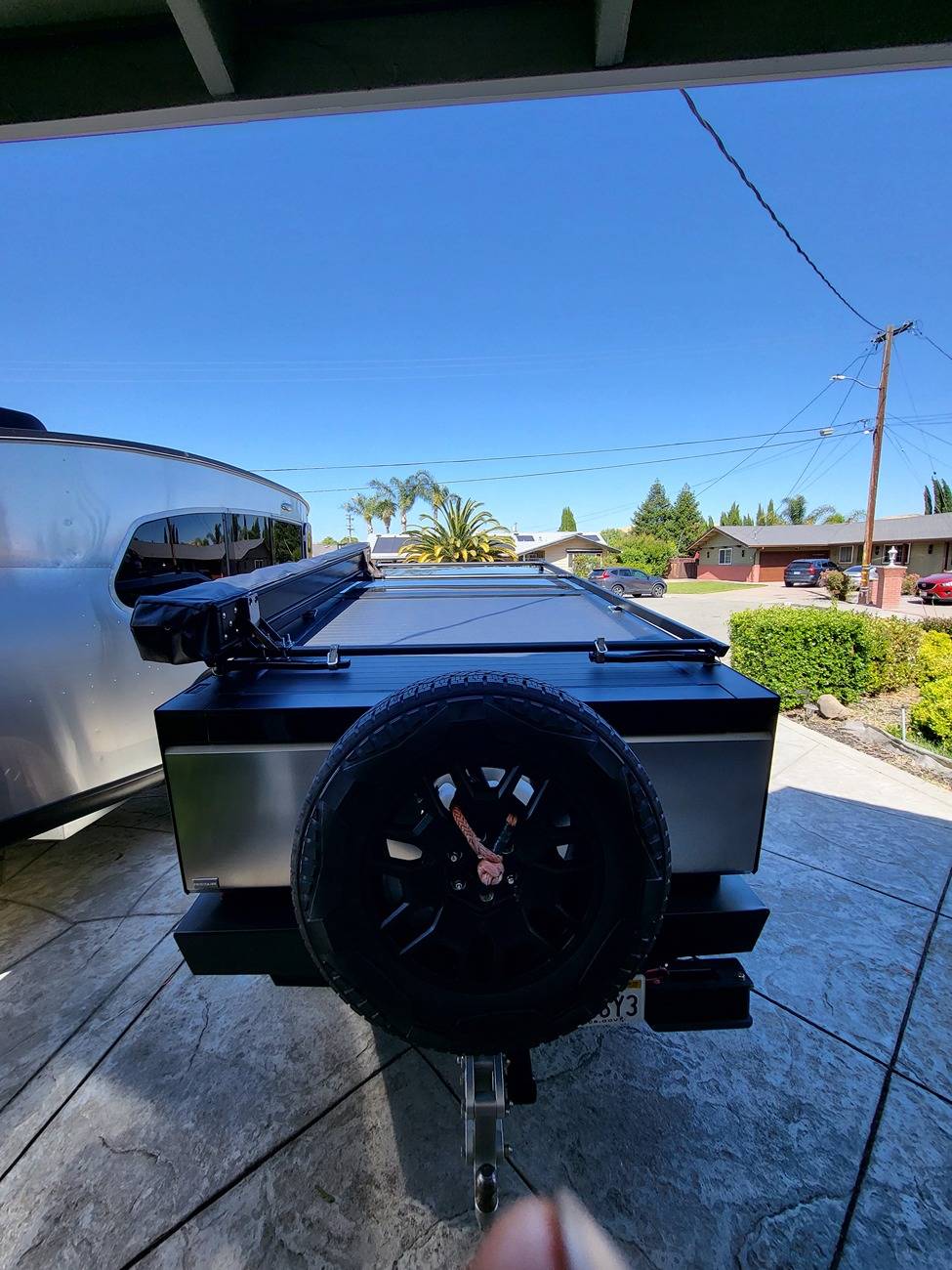 Tesla Cybertruck Spare tire roof rack installed on lower racks on my Cybertruck 20240601_153959