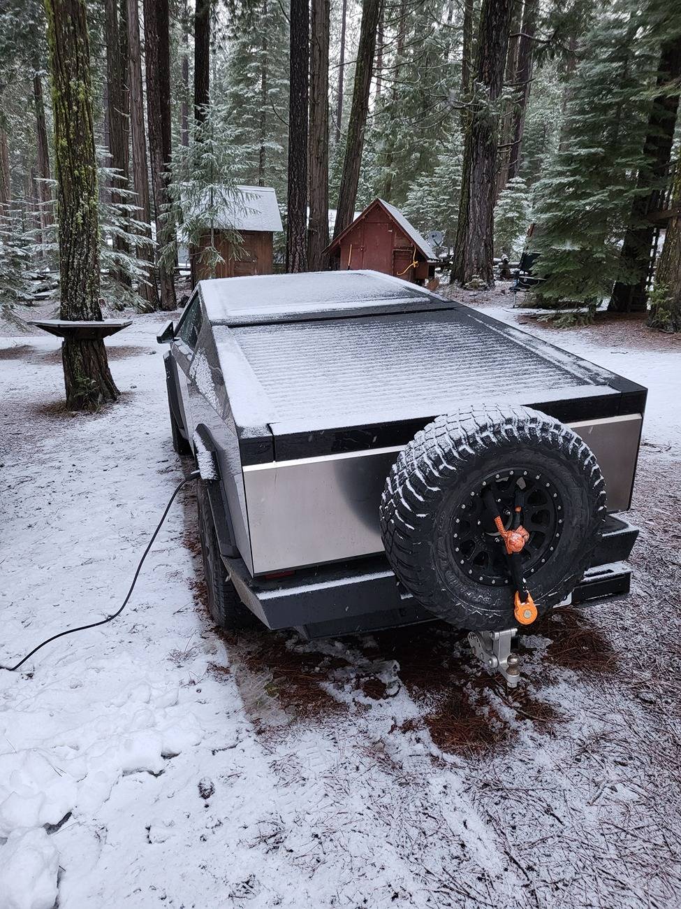 Tesla Cybertruck Spare tire roof rack installed on lower racks on my Cybertruck 20240331_072147