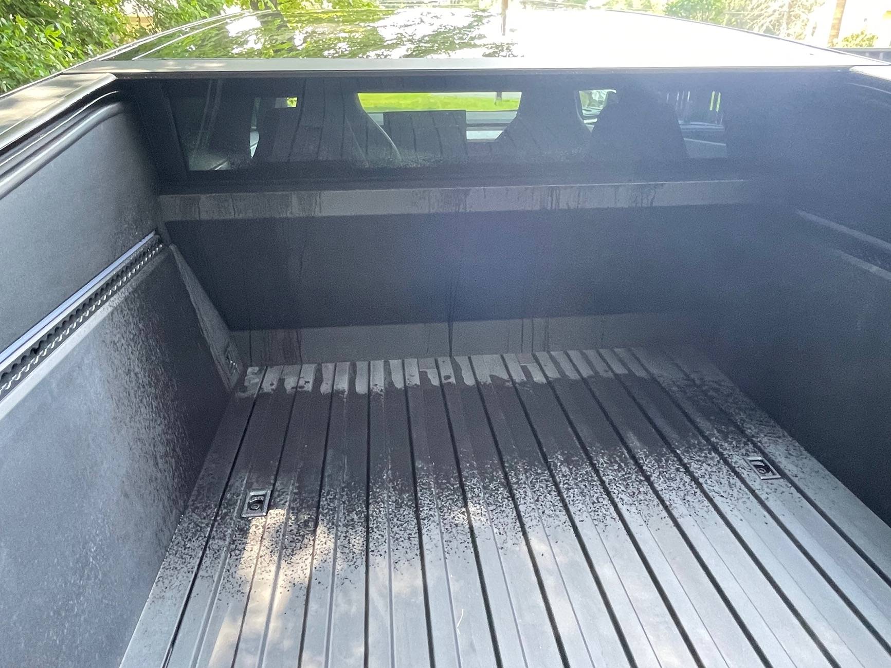 Tesla Cybertruck Tonneau cover leak DIY fix (cause: seal strip gap under aero flap) IMG_9020