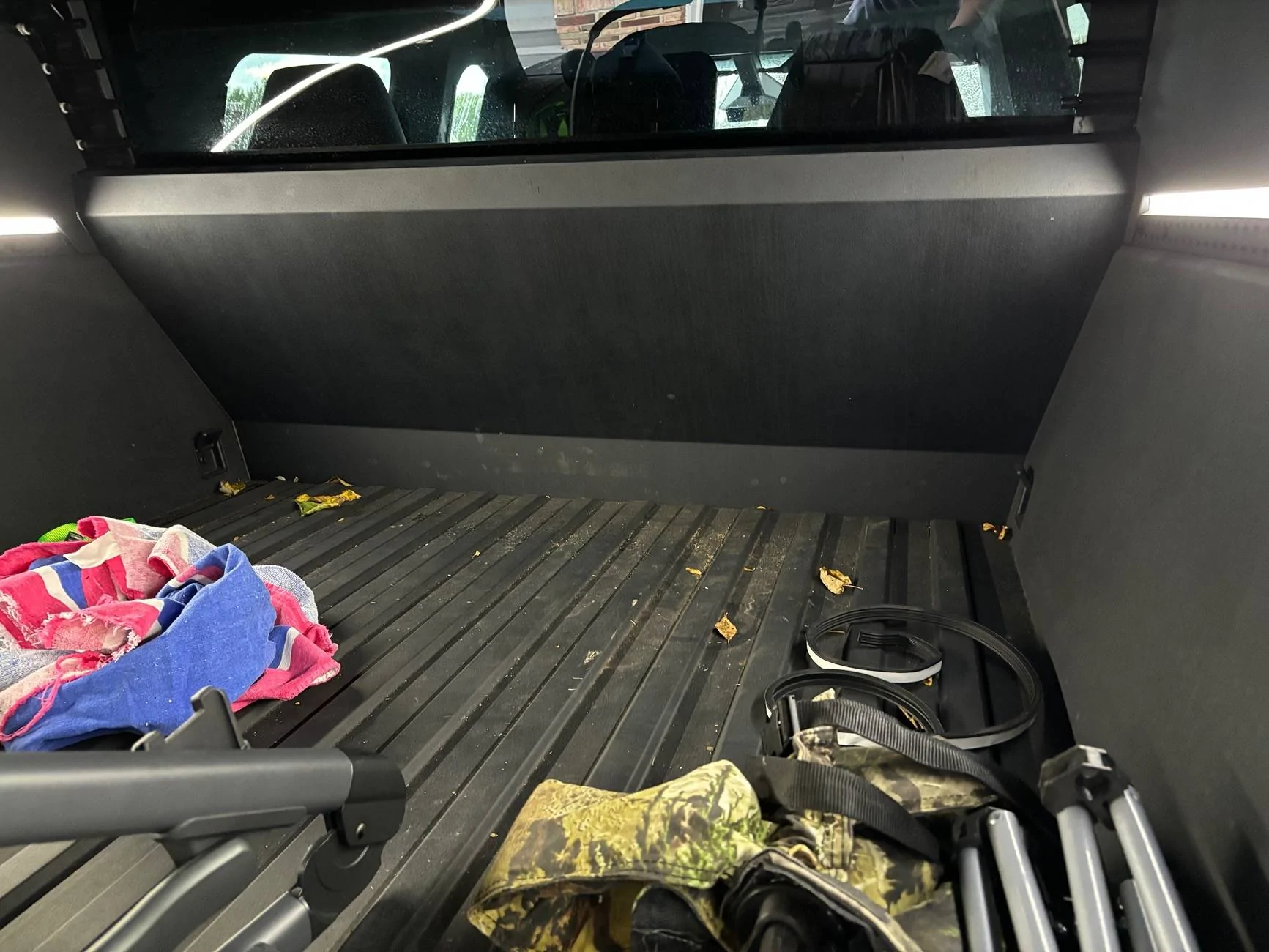 Tesla Cybertruck Tonneau cover leak DIY fix (cause: seal strip gap under aero flap) IMG_9903
