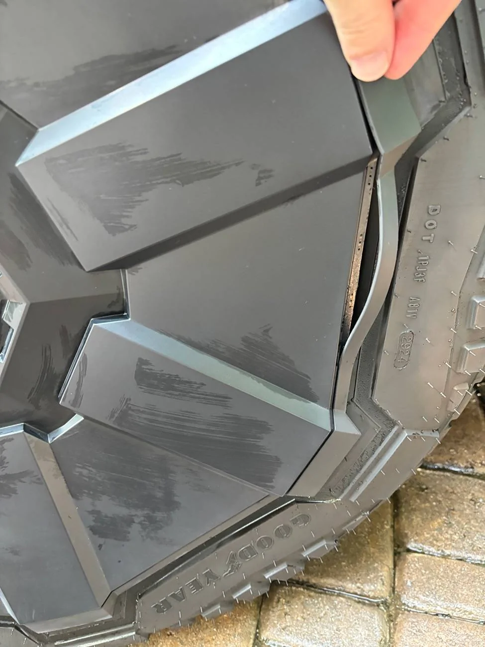Tesla Cybertruck New wheel cover trim separating! IMG_1918