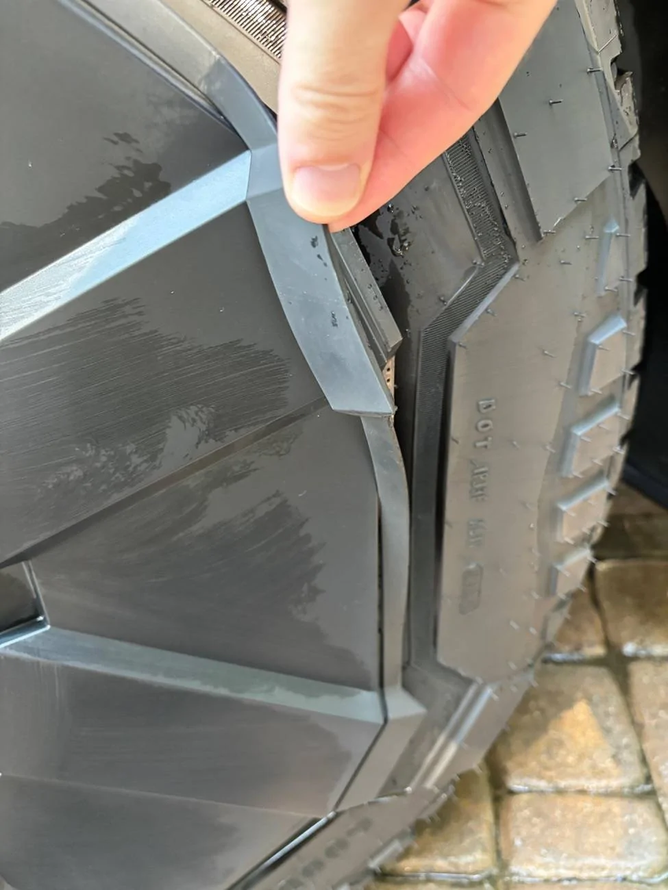 Tesla Cybertruck New wheel cover trim separating! IMG_1917