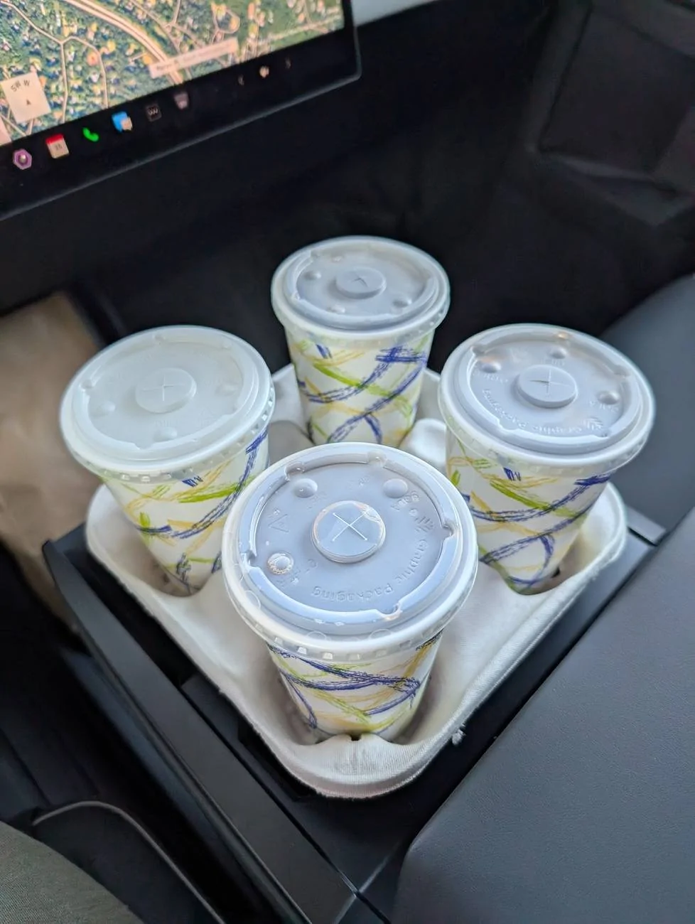 Tesla Cybertruck Cupholders Fit Coffee Shop Cup Carrier Trays Perfectly (Intentional?) PXL_20240915_113817088