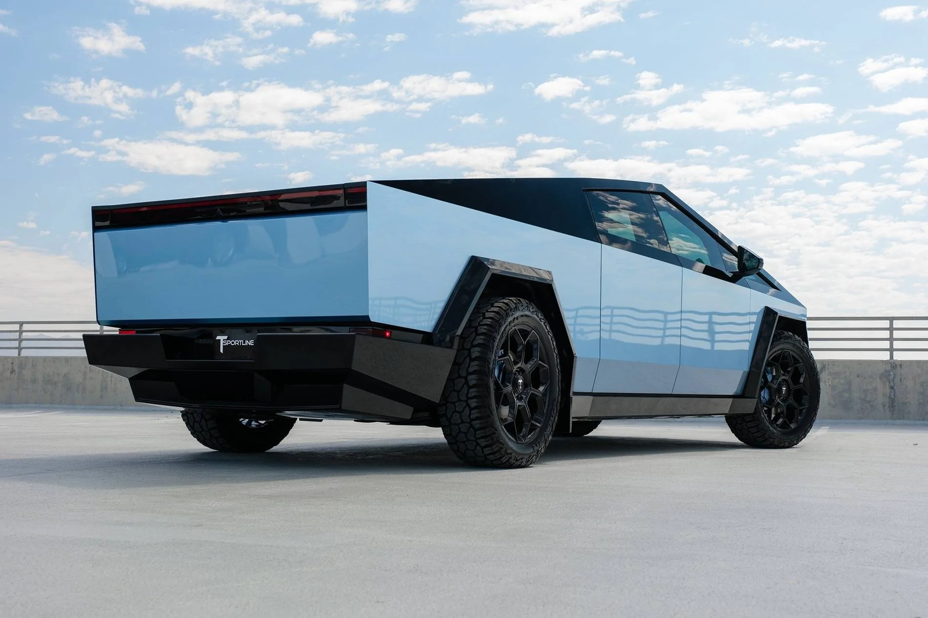 Tesla Cybertruck TWO-TONE / DUAL-TONE / MULTIPLE COLORS Vinyl Wrap & PPF Cybertruck -- Photos & Videos TMaxx Gloss Ice Blue and Hyper Black PPF, 2-tone color rear