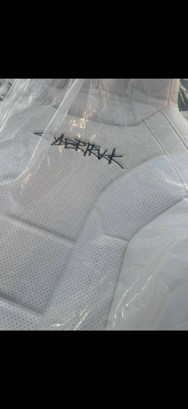 Tesla Cybertruck Aftermarket white leather seat covers from EVBASE -- installed review & photos IMG_9141