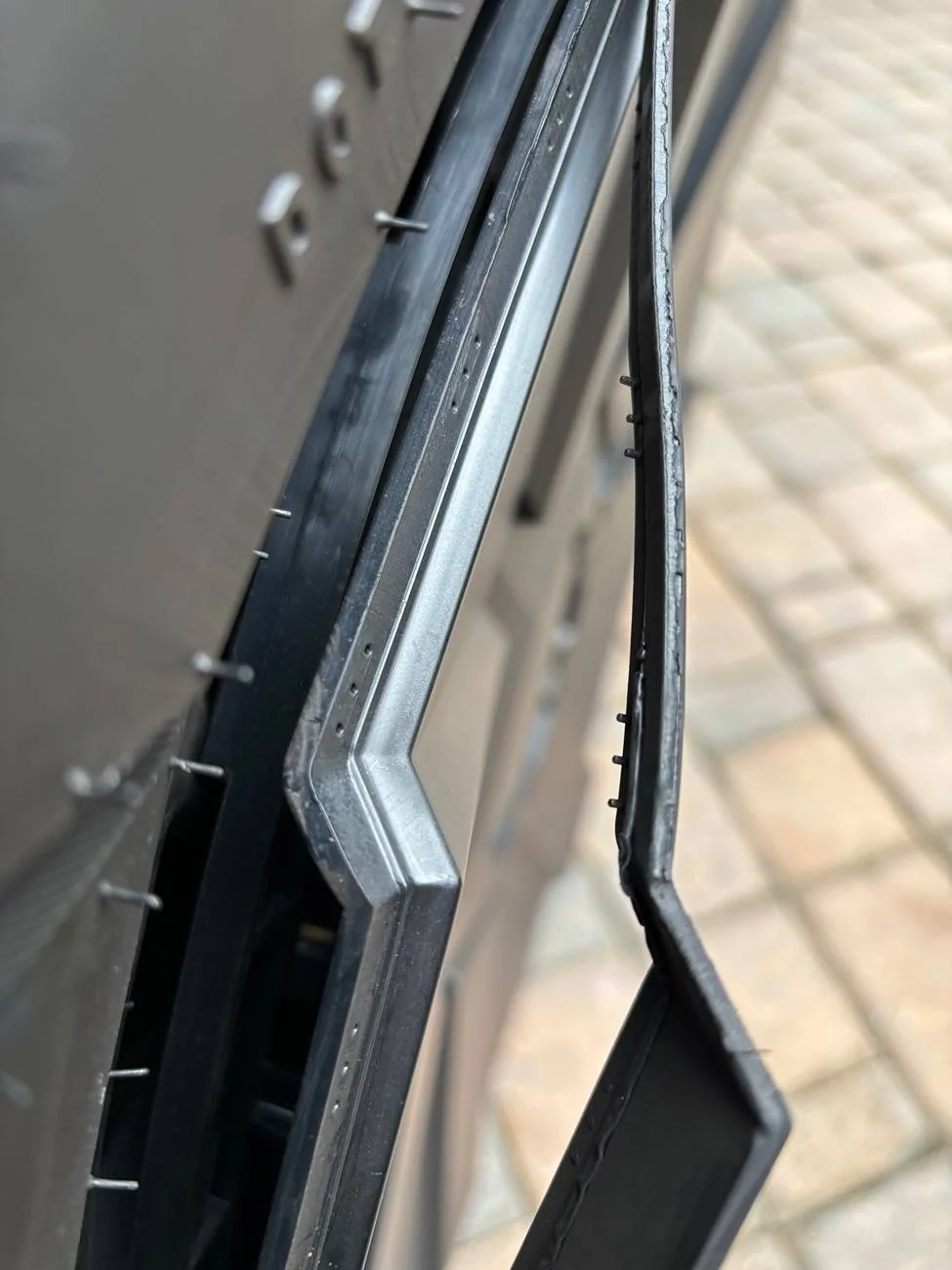Tesla Cybertruck New wheel cover trim separating! IMG_2020