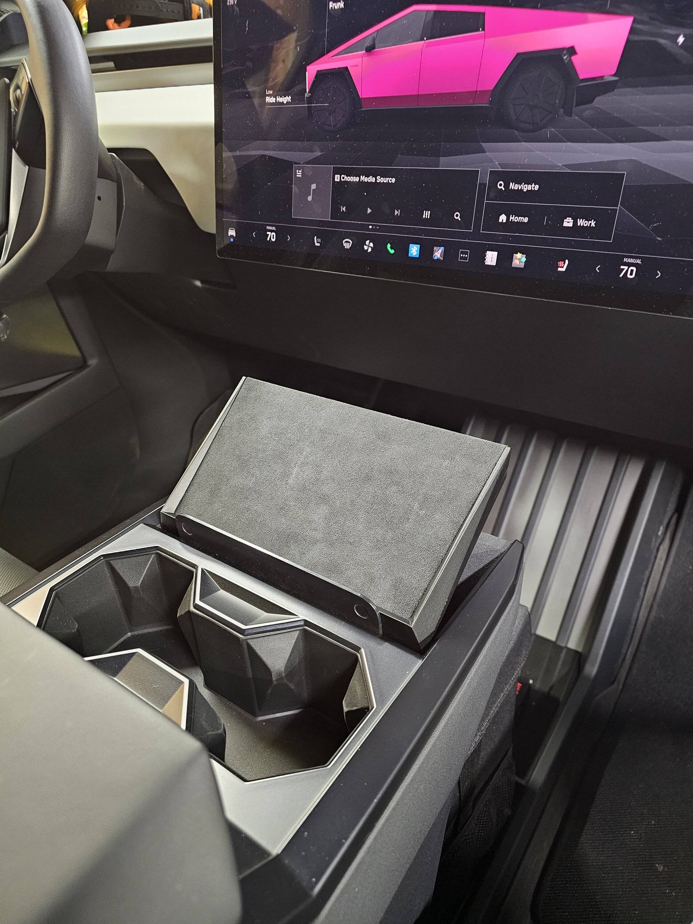 Tesla Cybertruck Knee Steering Knob + Elevated Wireless Charger Pad installed 20240929_201118
